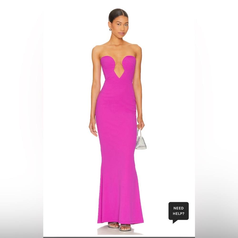 Incredibly flattering silhouette dress in electric pink. Sheer mesh in the front